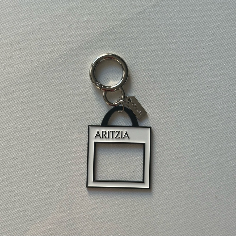 Limited Edition Aritzia Shopping Bag Shaped Enamel Key Chain in Black & White
